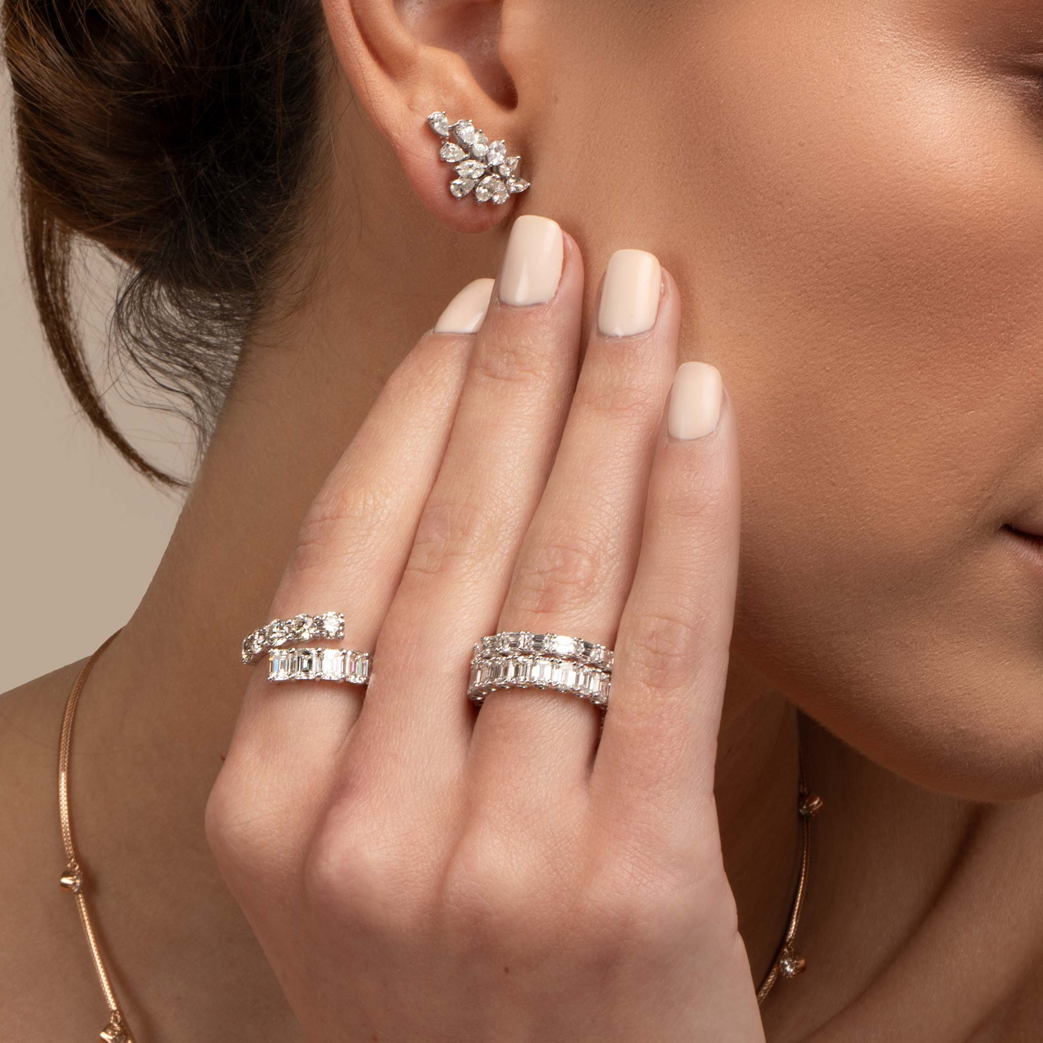 Emerald and Round Diamond Ring